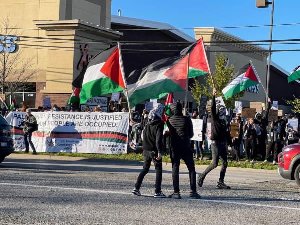 Pro-Palestinian counter-protestors stood outside a Solidarity with Israel event spo<em></em>nsored by the Midwest Regio<em></em>nal Office of the Simon Wiesenthal Center in Skokie on Oct. 22. One gunshot was fired into the air across the street in Lincolnwood but police said no one was injured. 